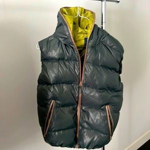 Brand new without tags: Green puffer vest.